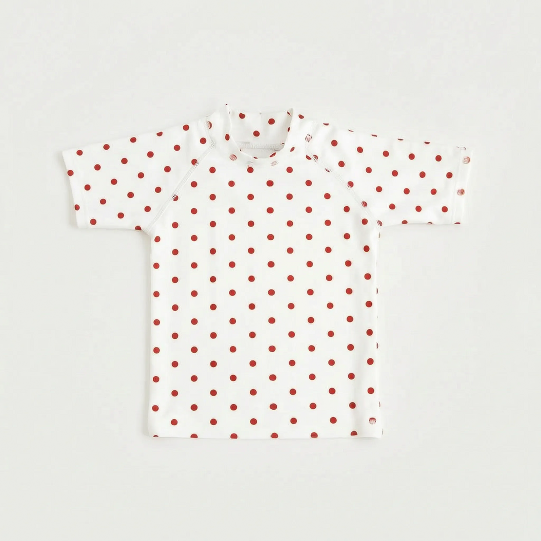Back view: Children's short-sleeve swim top, highlighting UPF 50+ sun protection for outdoor fun.