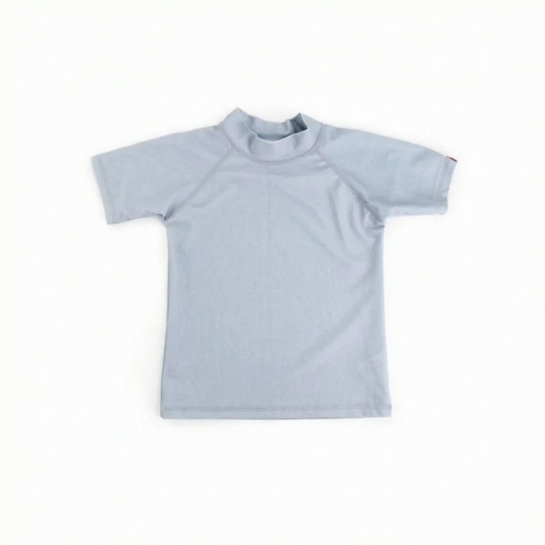 Vibrant kids' short-sleeve rash guard with UPF 50+ sun protection, perfect for summer adventures.