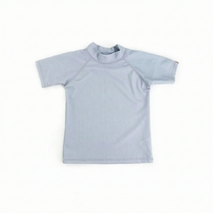 Vibrant kids' short-sleeve rash guard with UPF 50+ sun protection, perfect for summer adventures.