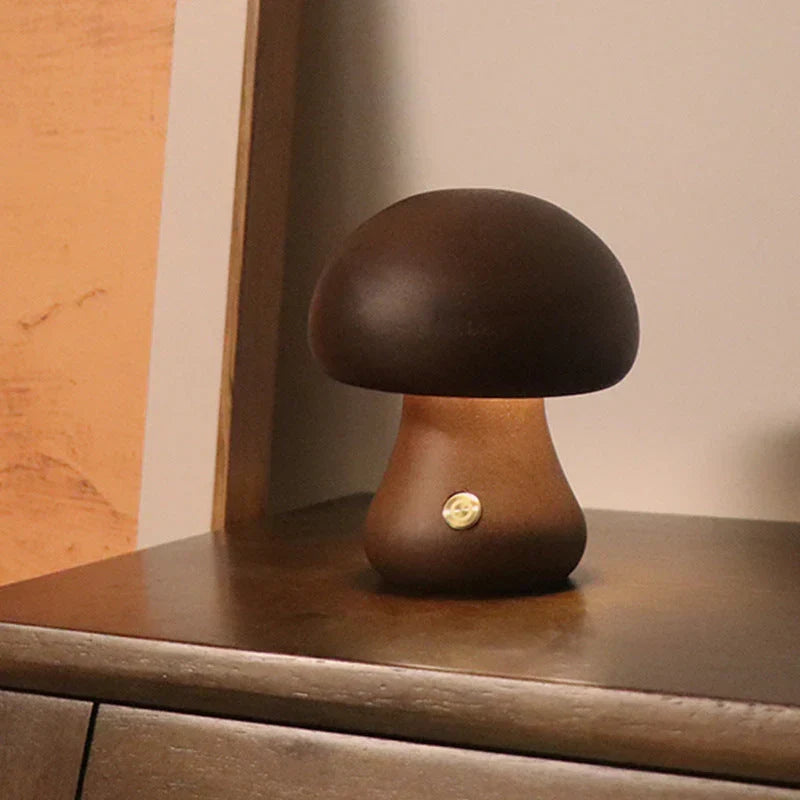 Kids' wooden mushroom LED night light, GlowShroom, offering a warm, energy-efficient glow for nursery decor.
