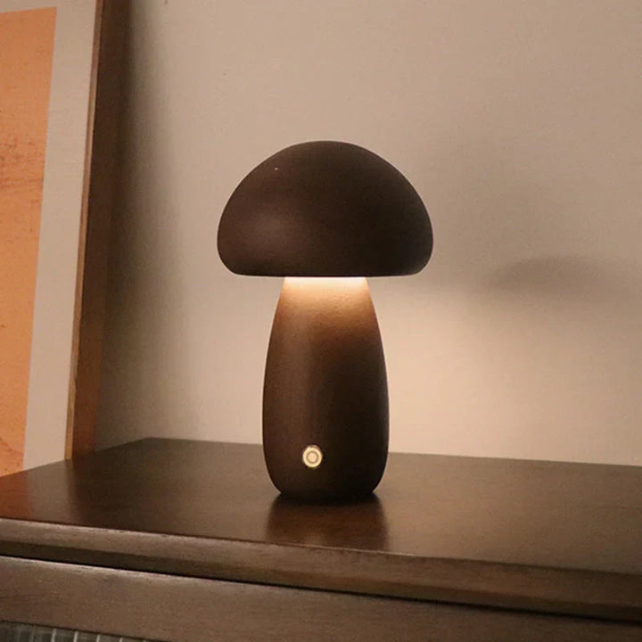 Kids' wooden mushroom LED bedside lamp, GlowShroom, offers a soft, warm light for comforting nights.