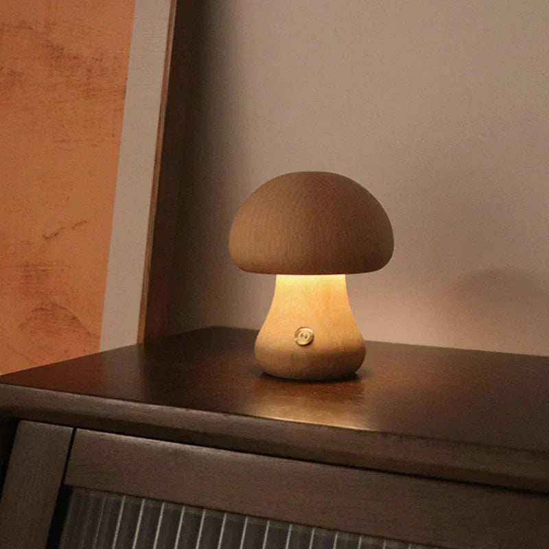 Toddler-friendly wooden mushroom LED night light, GlowShroom, enhances nursery decor with its warm, soft glow.