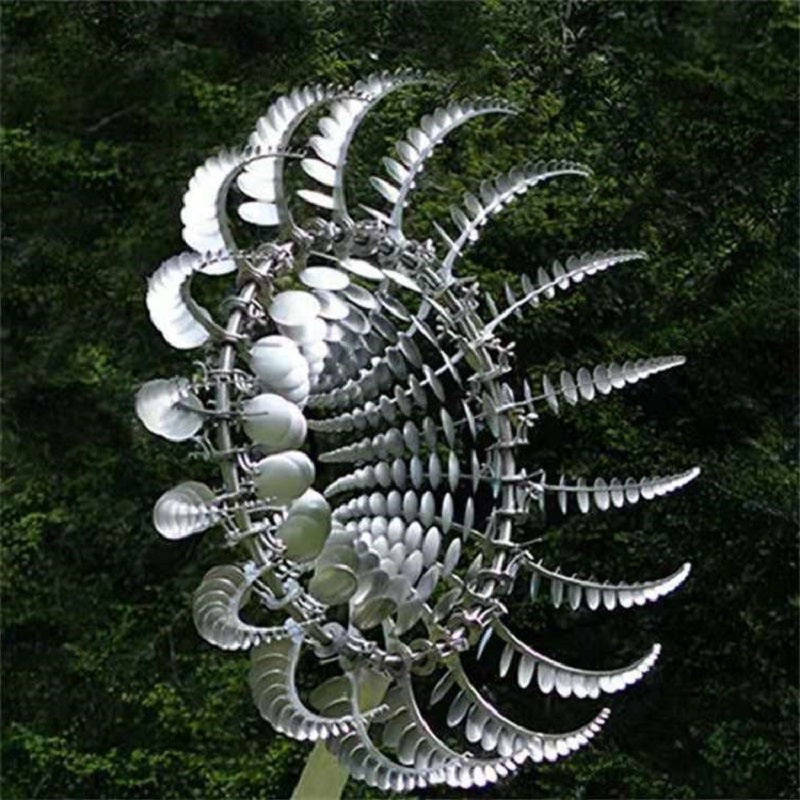 Kinetic metal garden wind spinner, rust-resistant, moving windmill art for yard and patio decor.