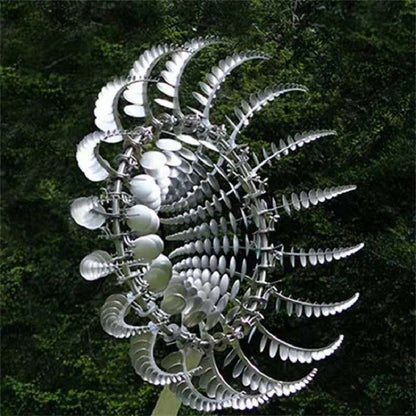 Kinetic metal garden wind spinner, rust-resistant, moving windmill art for yard and patio decor.