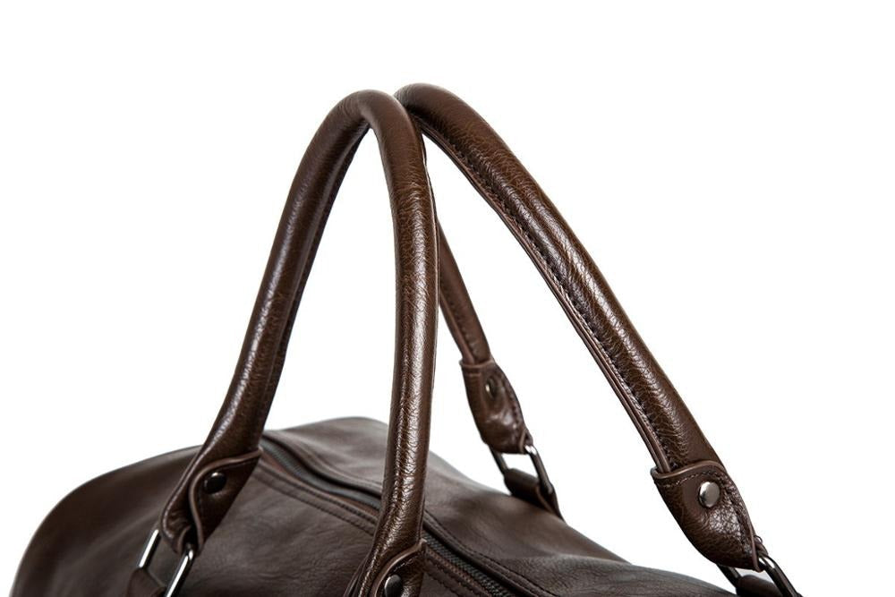 Spacious black faux leather weekender. Lightweight carry-on duffel, perfect for short trips & gym.