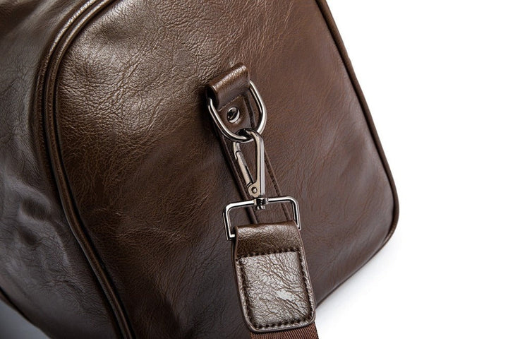Versatile large faux leather duffel bag. Lightweight, unisex design for travel, gym, and weekend trips.