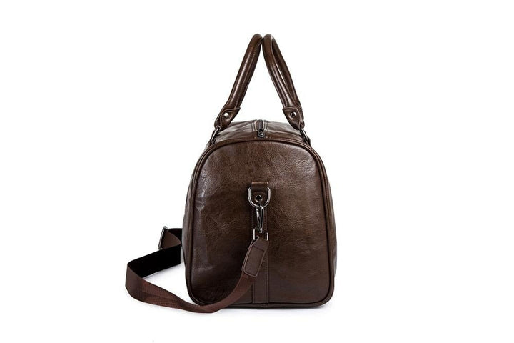 Lightweight faux leather duffel. Carry-on friendly, large capacity overnight bag for effortless travel.