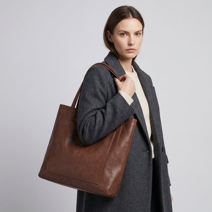 Chic black large women's tote shoulder bag. Ideal work bag & travel accessory with ample space.