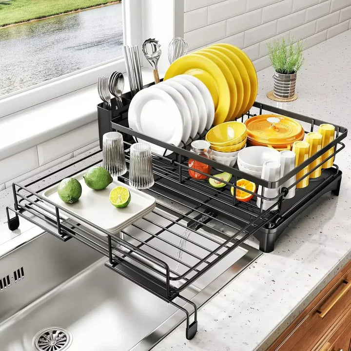 Modern large dish drainer with separate compartments for plates, bowls, and cutlery, includes drip tray.