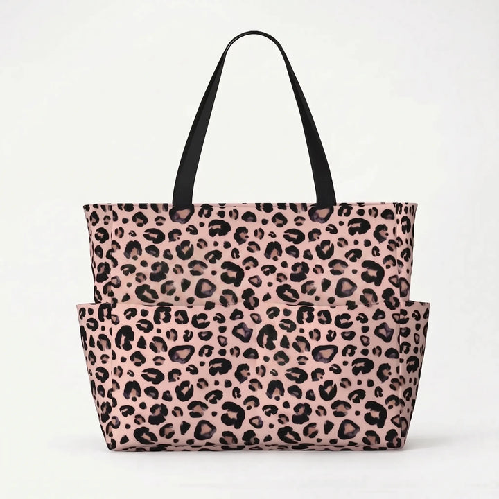 Foldable leopard print travel bag for women, a large capacity tote for beach & daily use.