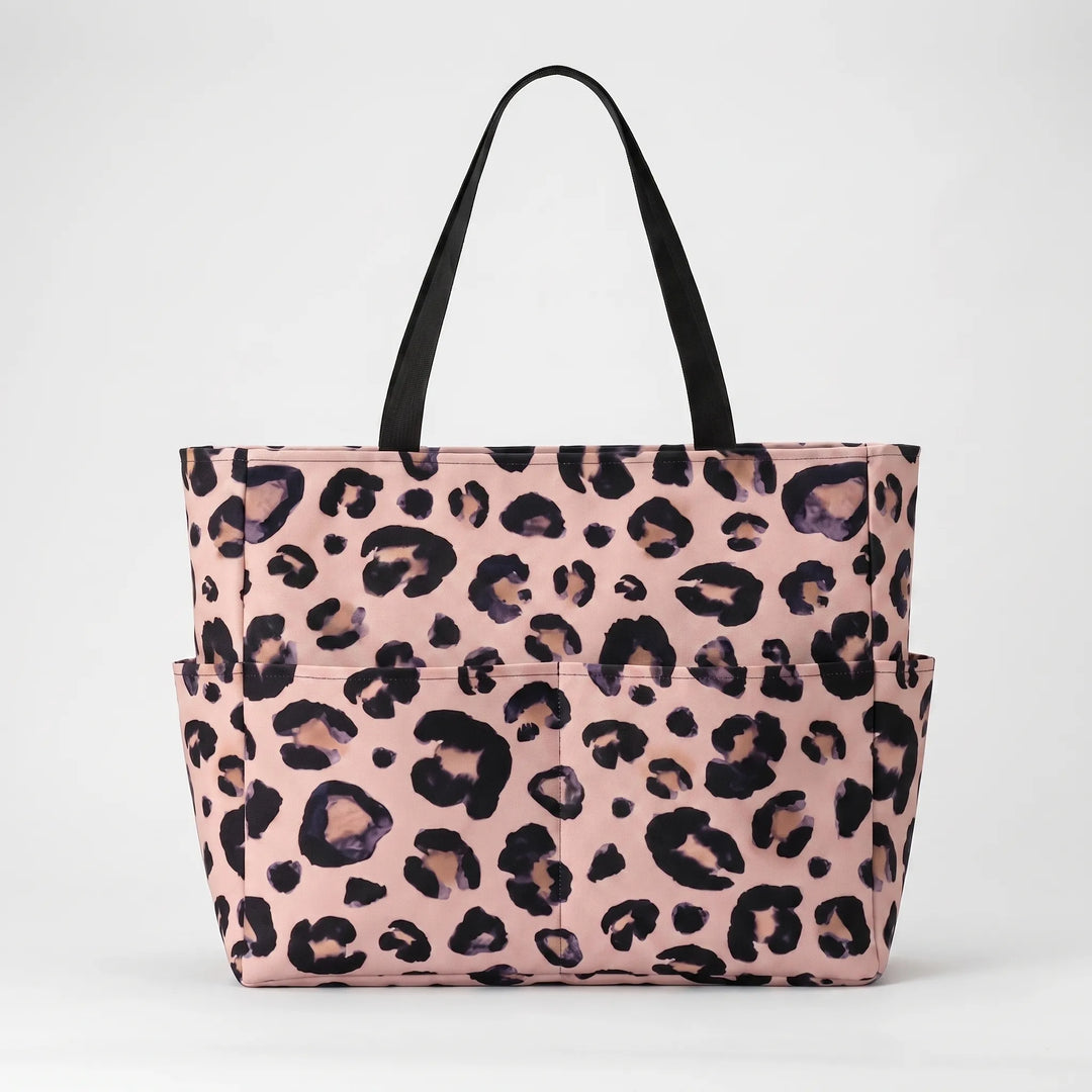 Spacious women's leopard print travel tote bag, ideal for beach trips & daily carry.