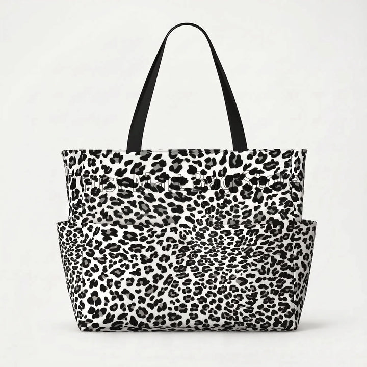 Chic leopard print design on a spacious women's travel tote, perfect for beach trips.