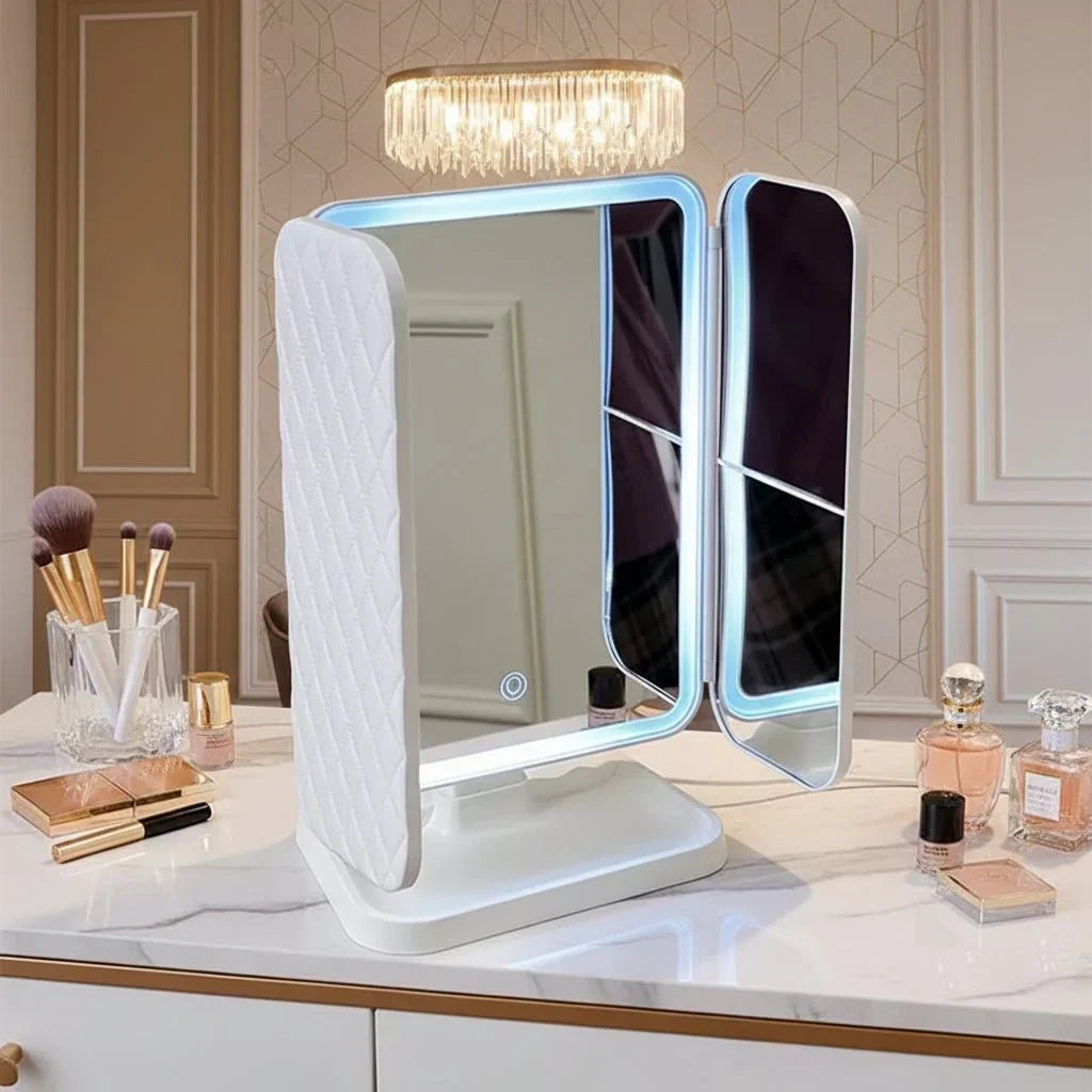 Professional tri-fold LED cosmetic mirror featuring 3 adjustable light modes for detailed makeup.