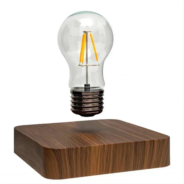 Innovative levitating light bulb on a sleek wood base, a magnetic floating lamp perfect as a unique modern home decor gift.