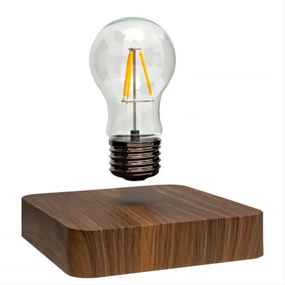 Innovative levitating light bulb on a sleek wood base, a magnetic floating lamp perfect as a unique modern home decor gift.