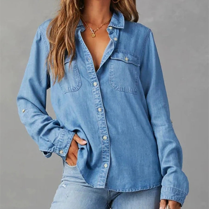 All-season women's light blue button-up shirt, a wardrobe essential with a relaxed fit and long sleeves.