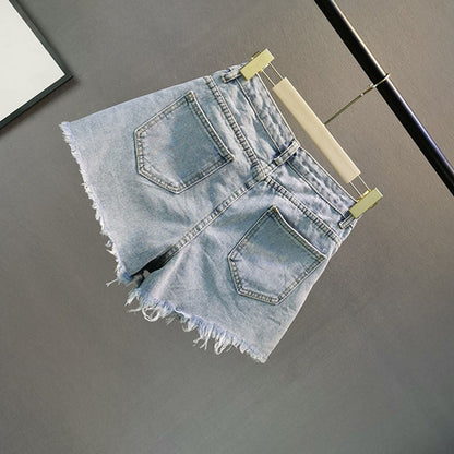 Sparkly light blue shorts for women with elegant diamond detailing, ideal for casual wear or party outfits.