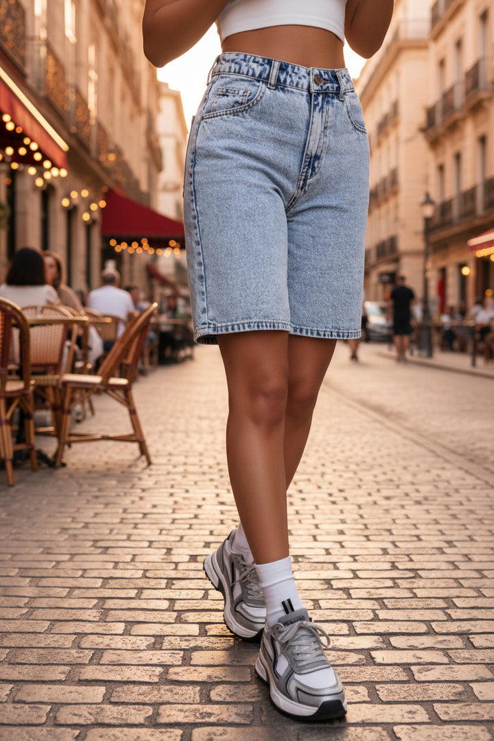 Stylish women's vintage inspired Bermuda shorts with pockets, a versatile and comfortable choice for summer outfits.