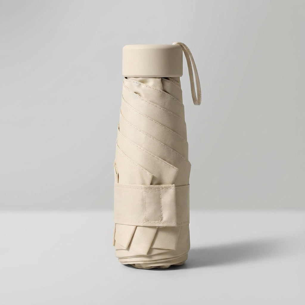 Light green windproof mini umbrella, a compact and stylish accessory for travel.