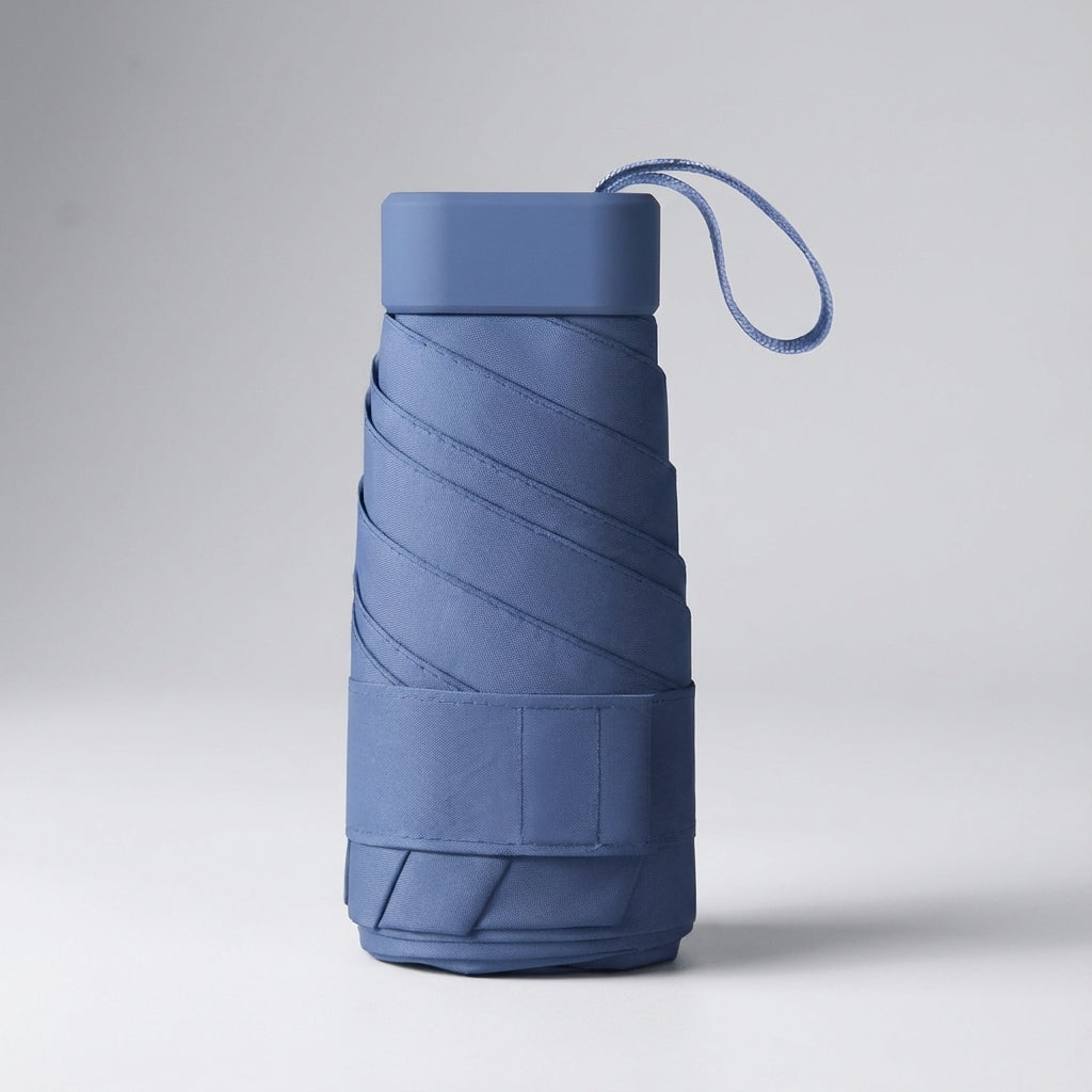 Tiny light green windproof umbrella, ultra-compact for pocket or small bag.