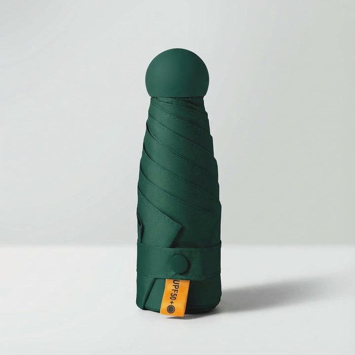 Light green mini umbrella, windproof and provides sun protection for travelers.