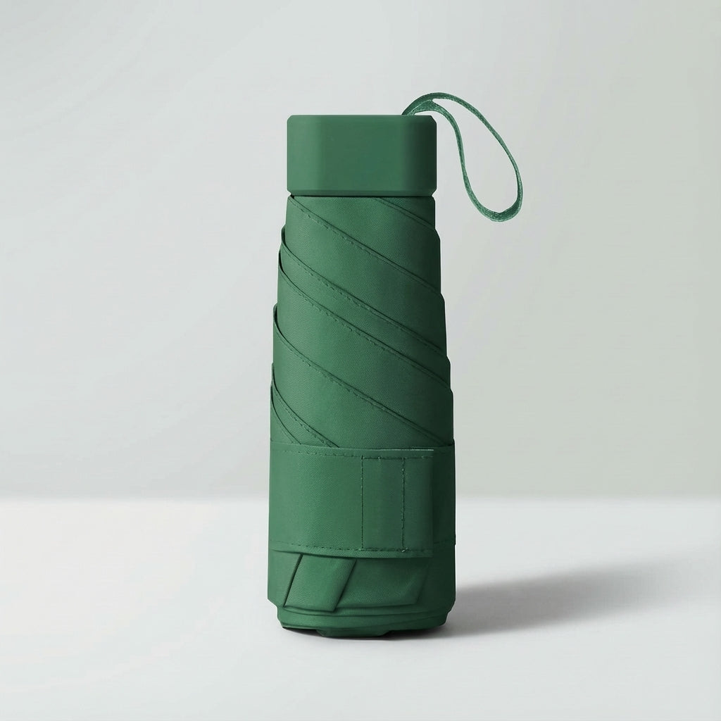 Essential light green windproof mini rain umbrella, compact for daily use.