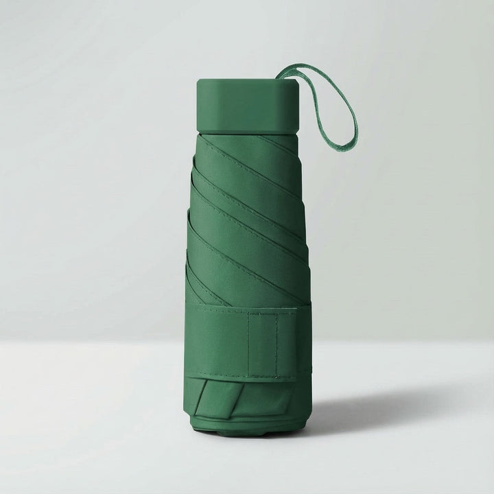 Essential light green windproof mini rain umbrella, compact for daily use.