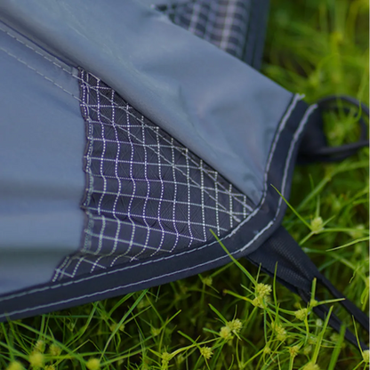 Durable 2-person backpacking tent with poles and stakes, ready for outdoor camping adventures.
