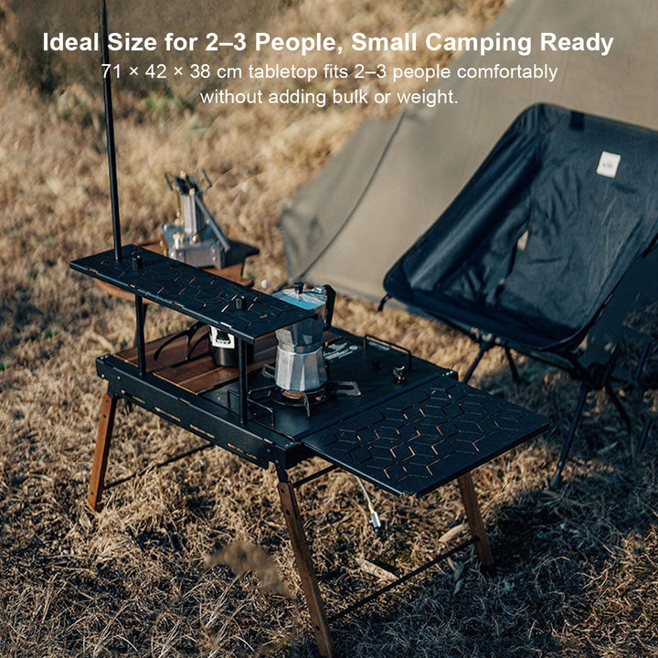 A person easily carrying a lightweight aluminum foldable camping table, emphasizing its portability for camping furniture.