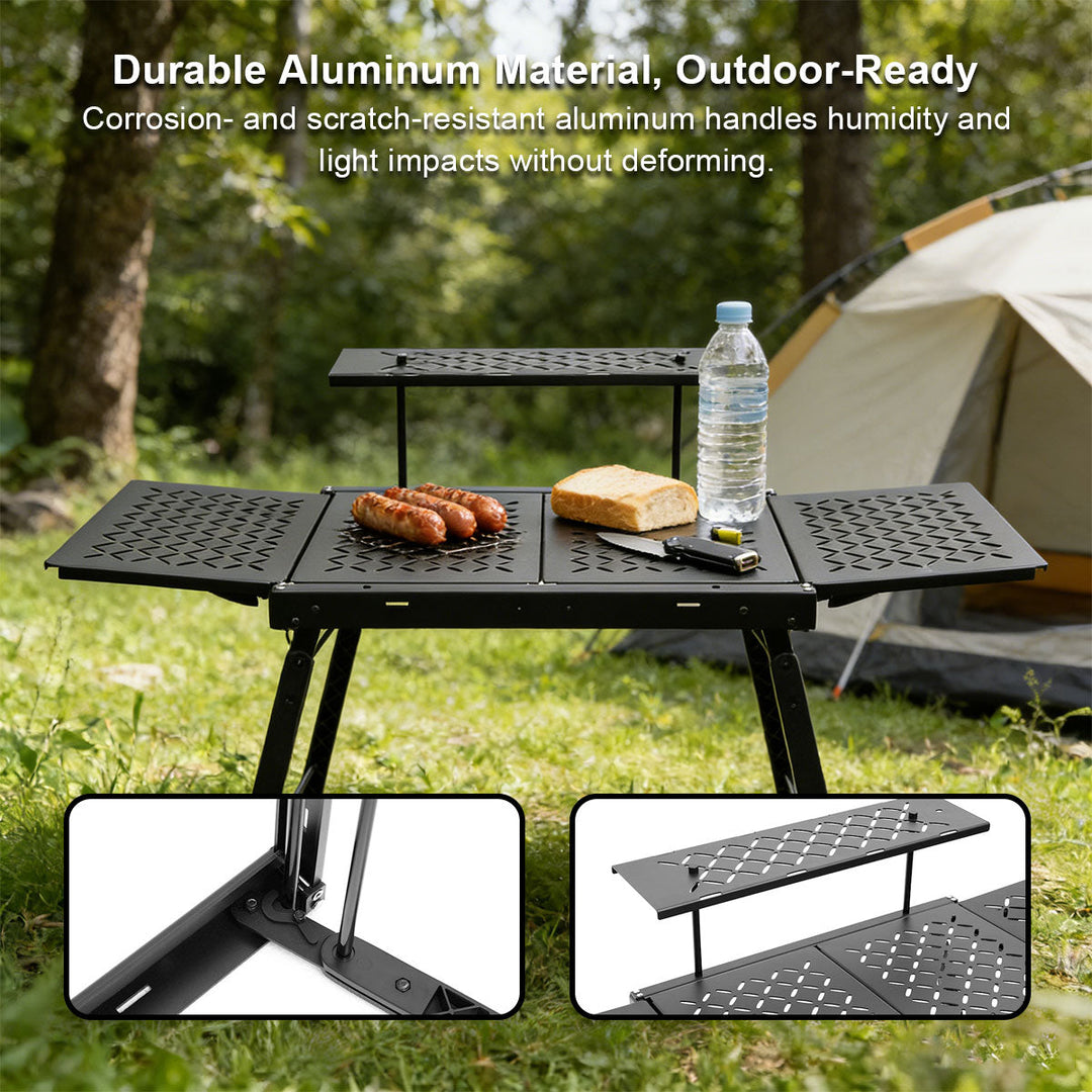 Lightweight aluminum camping table set up in a natural outdoor environment, showcasing its utility as portable camp furniture.