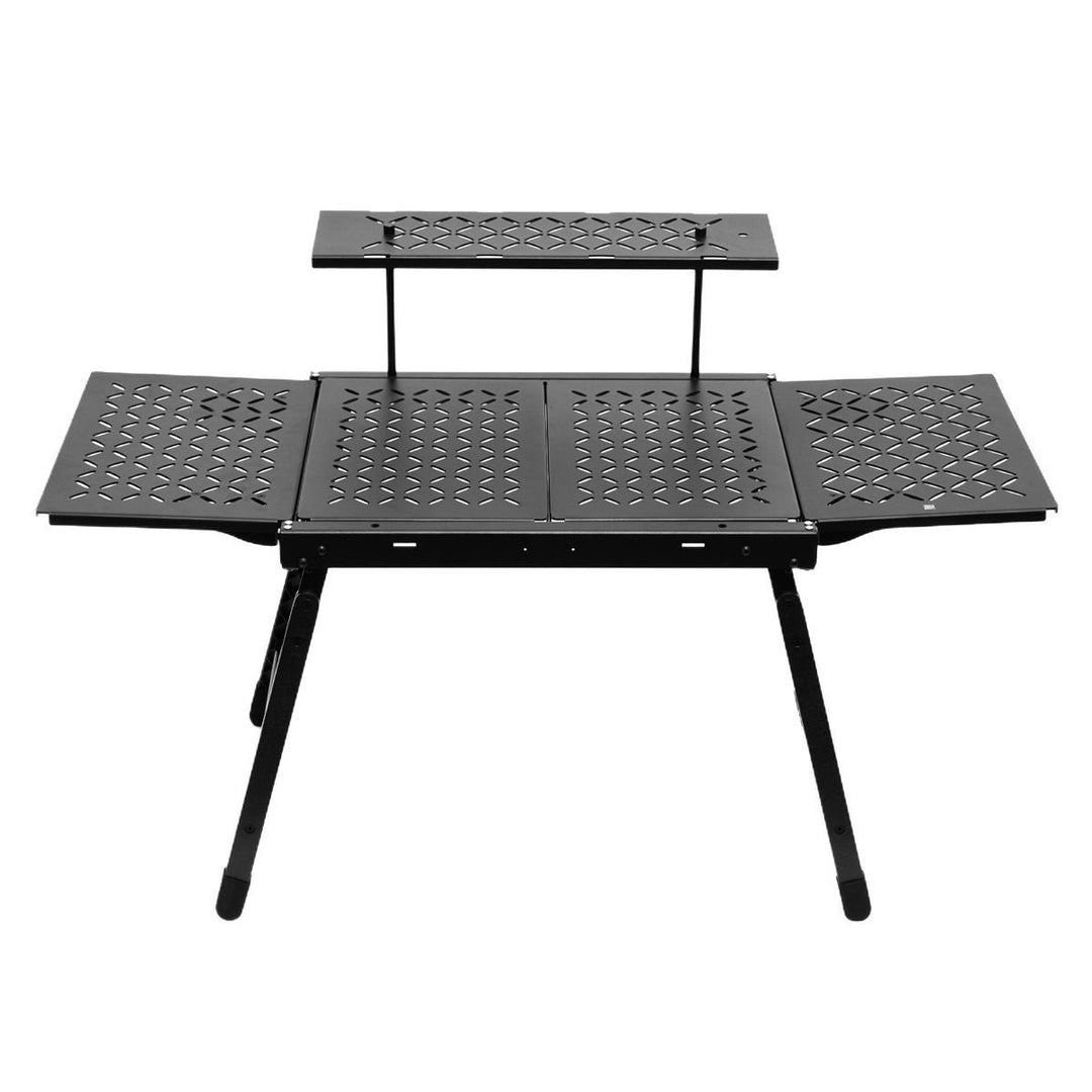 Lightweight aluminum foldable camping table, highlighting its compact folded size against an outdoor backdrop, perfect for camp furniture.