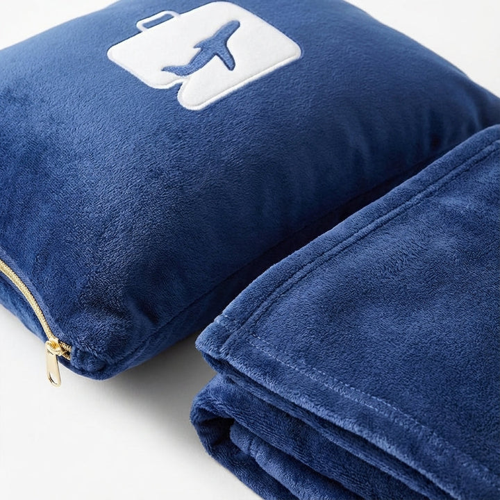 Soft, warm, & compact ComfiTrip travel blanket, ideal for airplane, car, or outdoor relaxation.