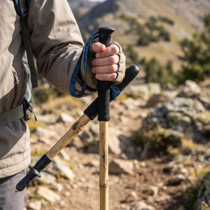 Lightweight foldable trekking pole, perfect for compact storage & easy transport on hiking trails & adventures.