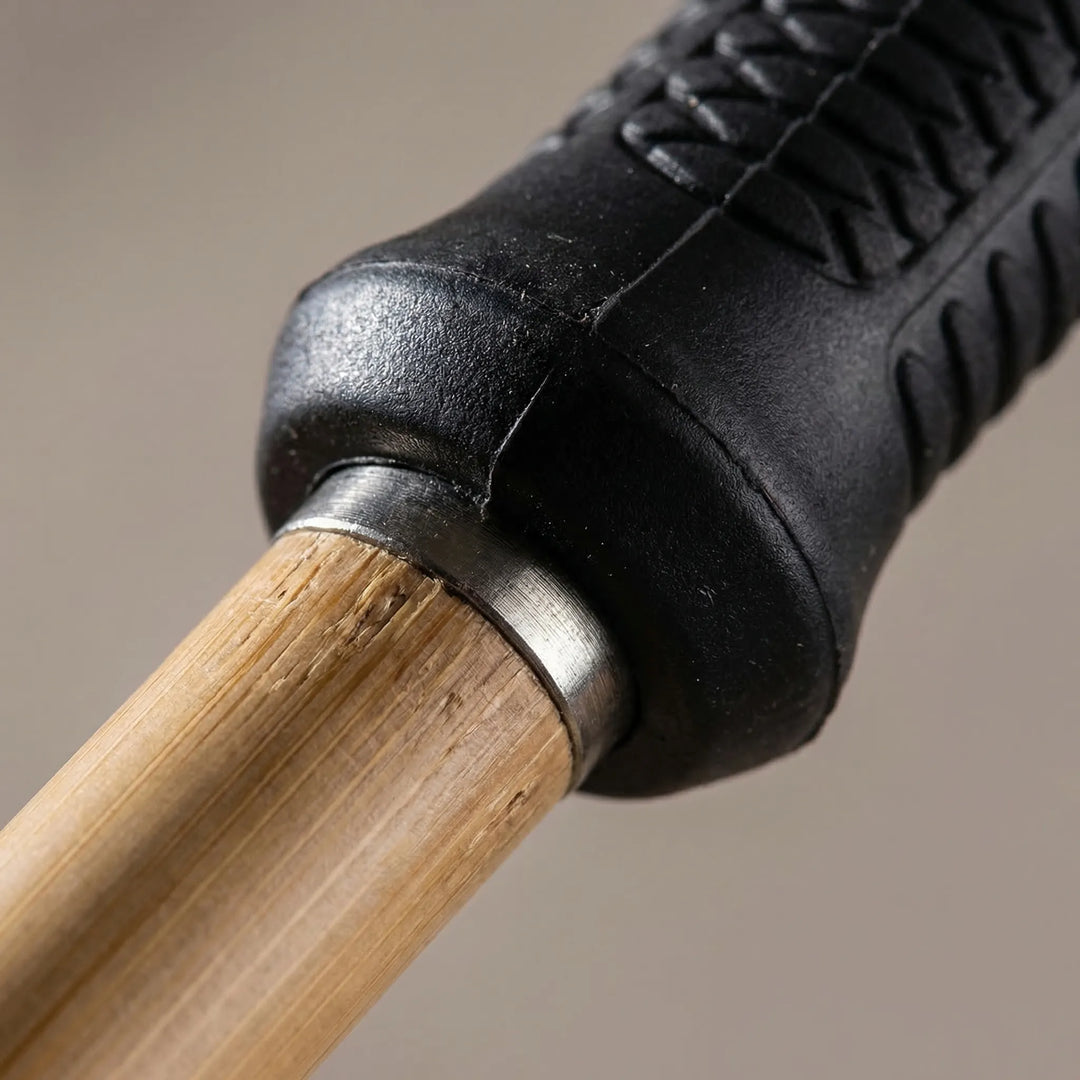 Compact hiking stick for men & women, offering reliable support on diverse terrains for trail walking & trekking.
