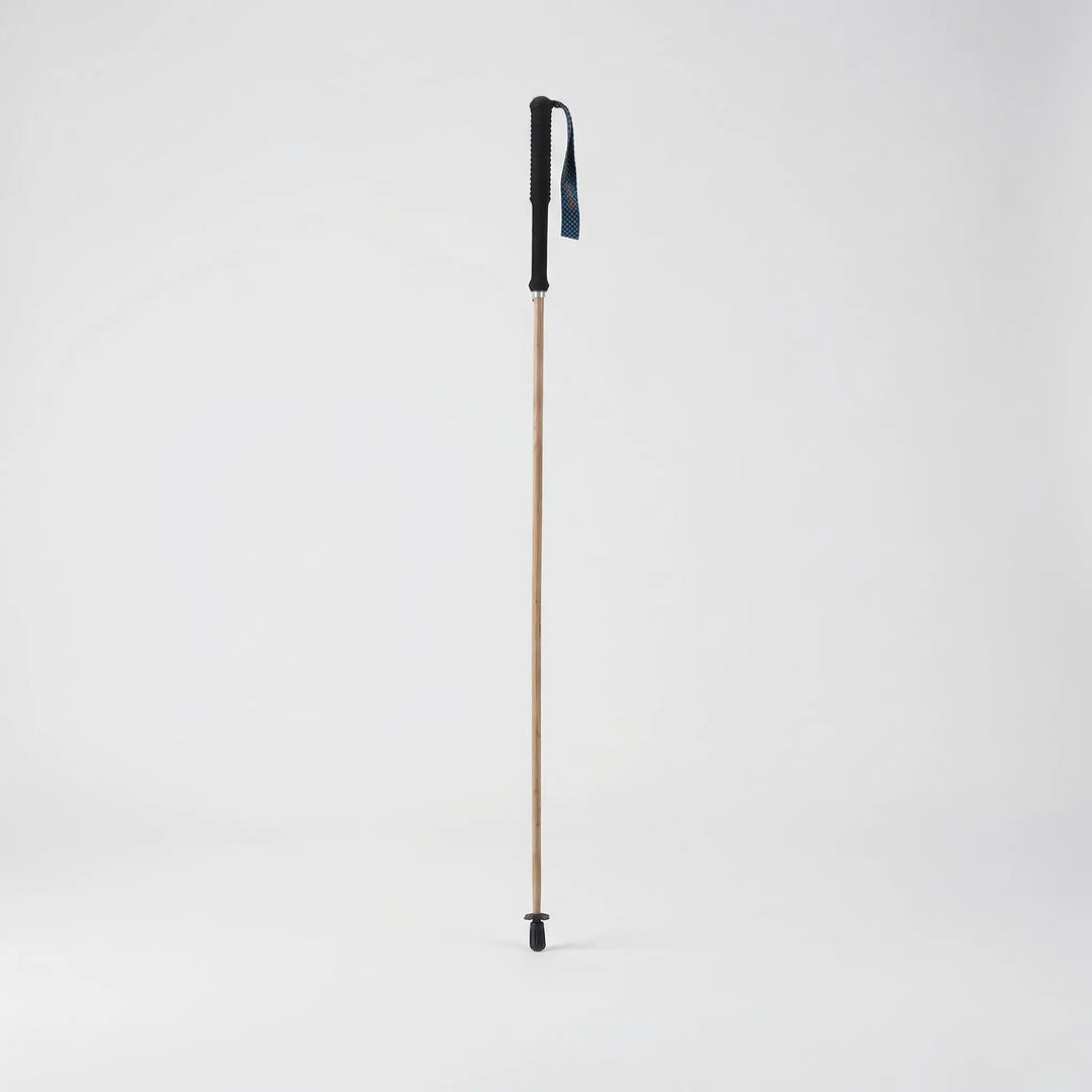 Versatile unisex folding walking stick, featuring a lightweight design & bamboo finish for various outdoor gear needs.