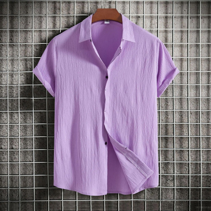 Smart casual men's long sleeve button-up shirt, versatile and comfortable for everyday style.