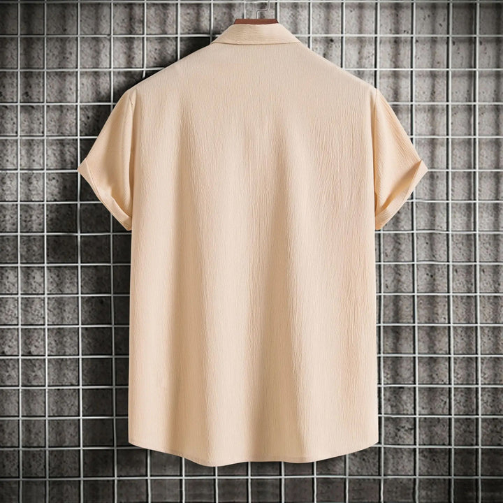 Elegant men's button-up long sleeve shirt, suitable for formal wear or a polished smart casual look.