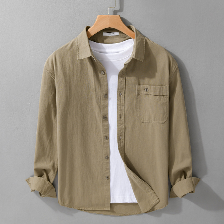 Lightweight men's casual button-up shirt. Versatile long sleeve top for summer, office, or weekend wear.