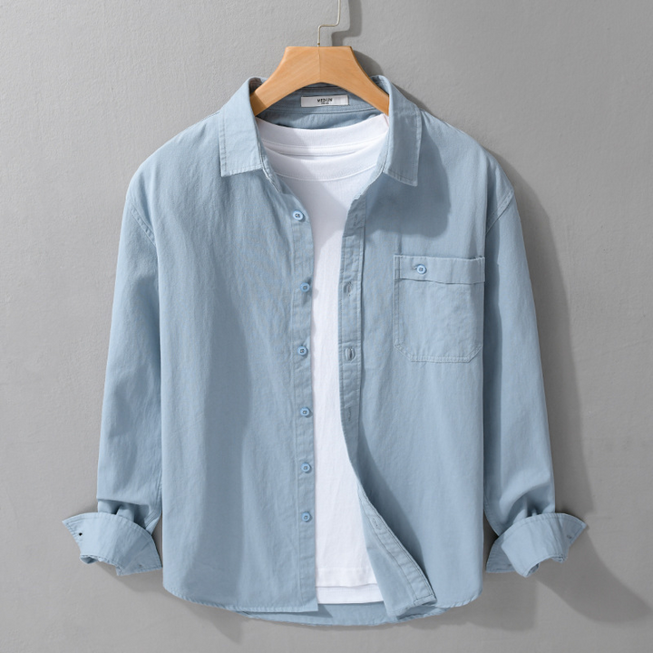 Man in a lightweight long sleeve button-up shirt, perfect smart casual top for office or weekend adventures.