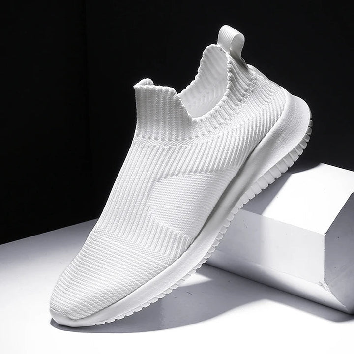 Slip-on men's knit sneakers offering ultimate comfort for walking, gym workouts, or casual everyday wear.