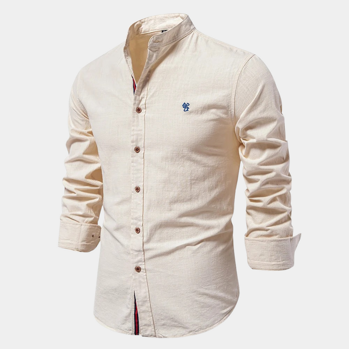 Elegant slim-fit men's long-sleeve button-down shirt, ideal for stylish warm-weather outfits.