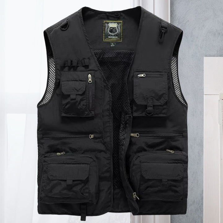 Men's lightweight multi-pocket vest for spring/summer adventures, great for travel & outdoor layering.