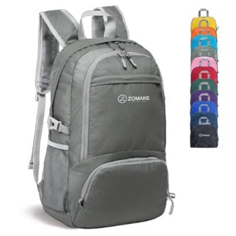 Model wearing a lightweight packable backpack while hiking, showcasing ergonomic design.