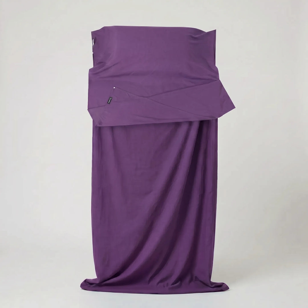 Versatile sleeping bag liner for travel, camping, and hostels. Offers hygienic protection & lightweight comfort.