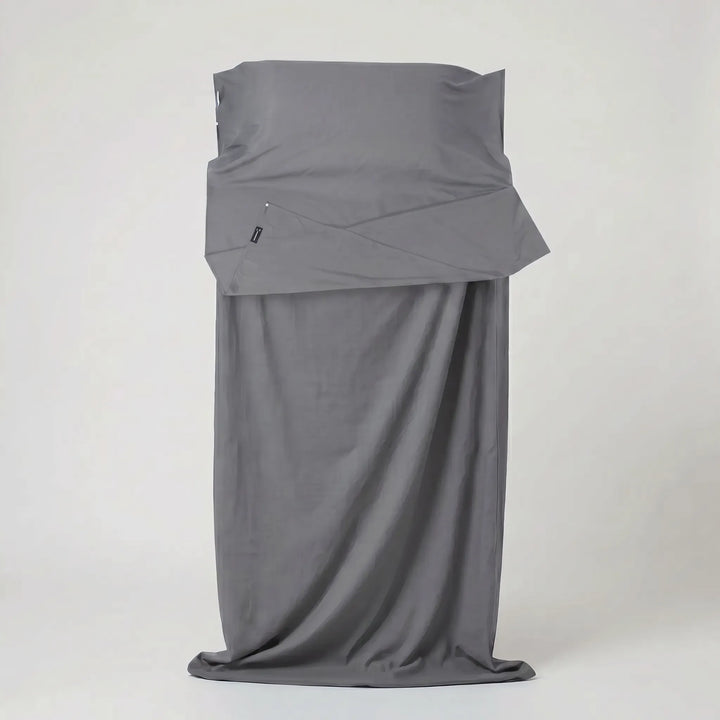 Ultra-light travel sleeping bag liner, easy to pack for camping, hostels, or backpacking. Enhances sleep hygiene.