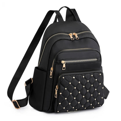 Lightweight water-resistant nylon women's backpack, ideal for daily school use & travel.