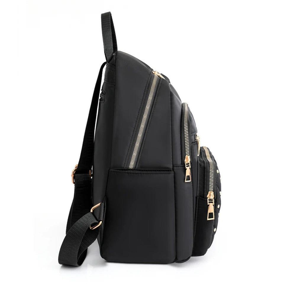 Versatile black nylon women's backpack, lightweight and water-resistant for stylish daily commutes.