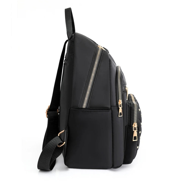 Versatile black nylon women's backpack, lightweight and water-resistant for stylish daily commutes.