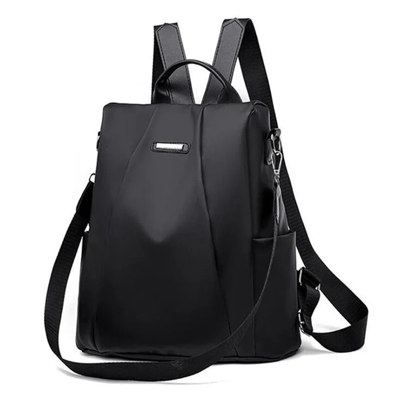 Lightweight water-resistant women's nylon backpack. Multi-way carry: shoulder, crossbody. Perfect for travel & everyday.