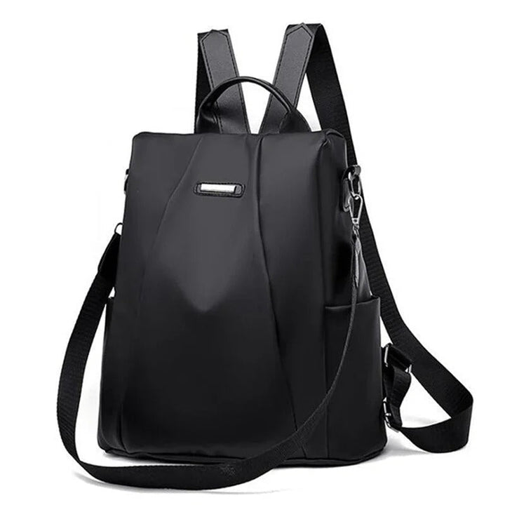 Lightweight water-resistant women's nylon backpack. Multi-way carry: shoulder, crossbody. Perfect for travel & everyday.